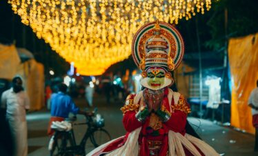 a person dressed in a costume and headdress