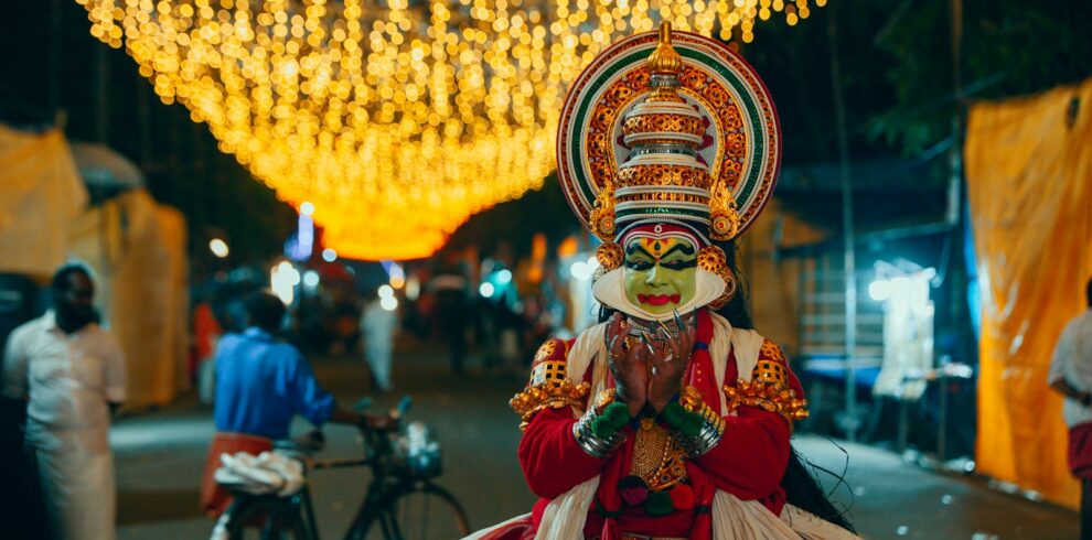 a person dressed in a costume and headdress