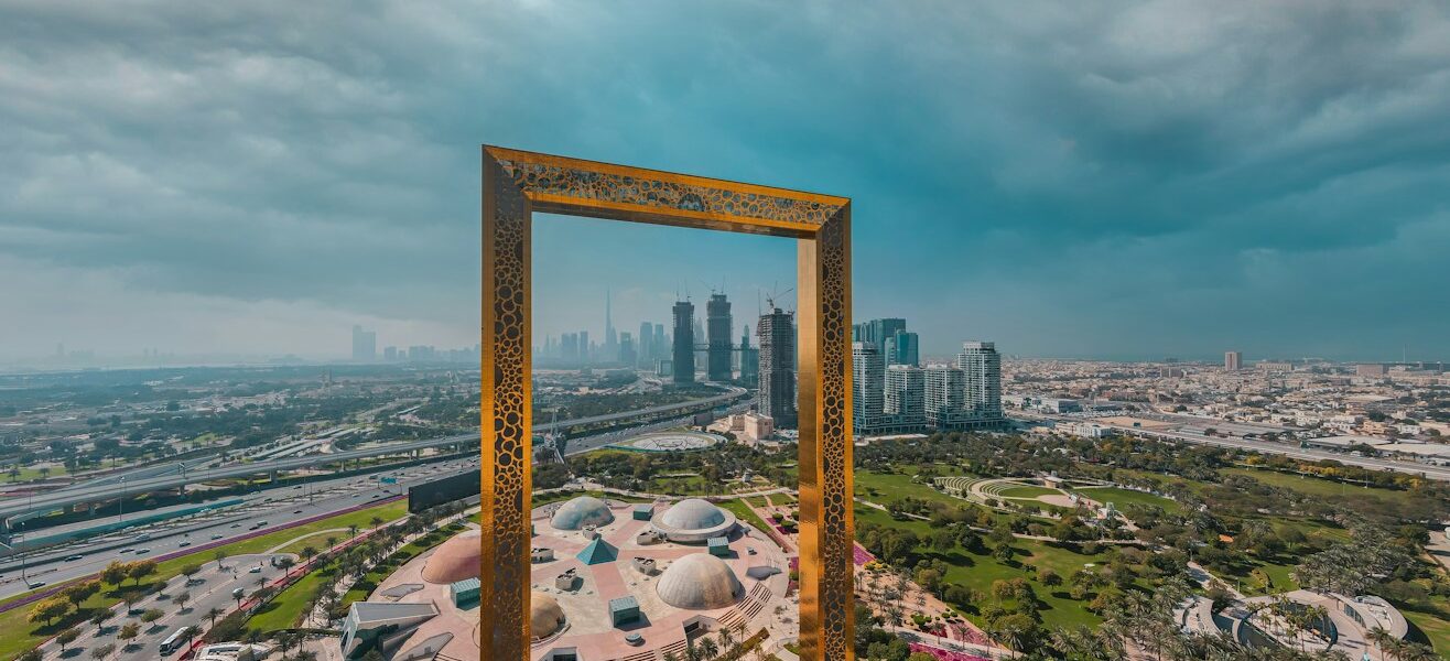 brown wooden framed mirror on top of a building