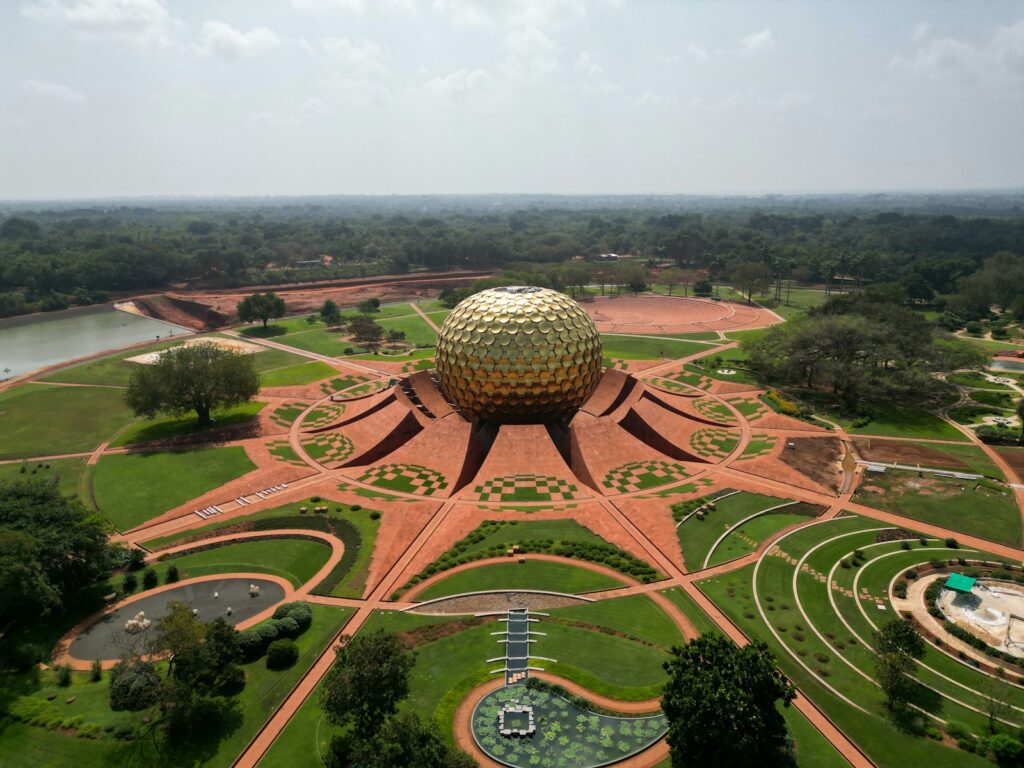 Current image: an aerial view of a park with a large ball in the center